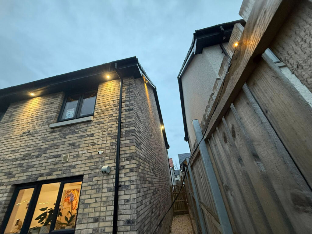 Soffit lighting installation enhancing exterior of home in The Central Belt